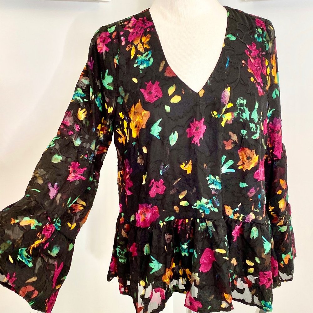 Floral burn out top with bell sleeve.